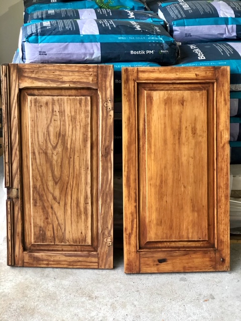 two wood doors next to each other, one is lighter than the other as it has been bleached to whitewash